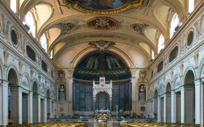 Elisabetta Guido dirige il coro A.M.Family nella Basilica di Santa Cecilia a Roma